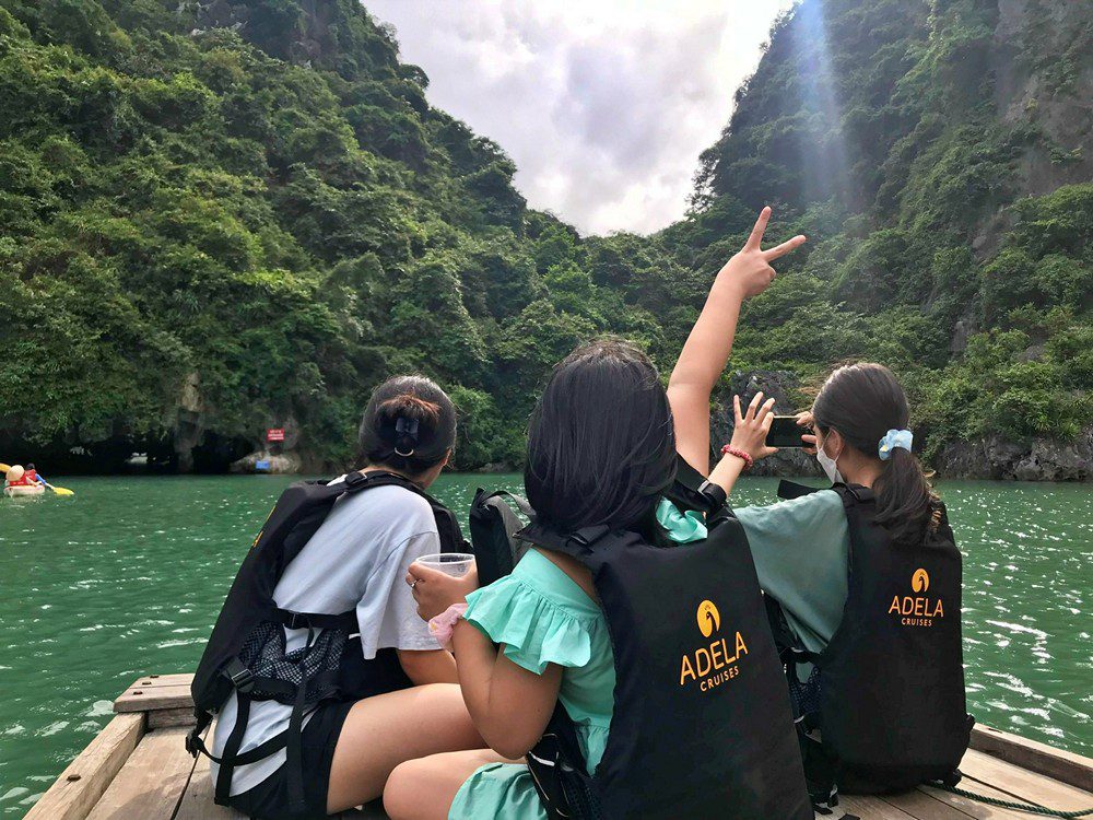 Visit Bright cave on bamboo boat 